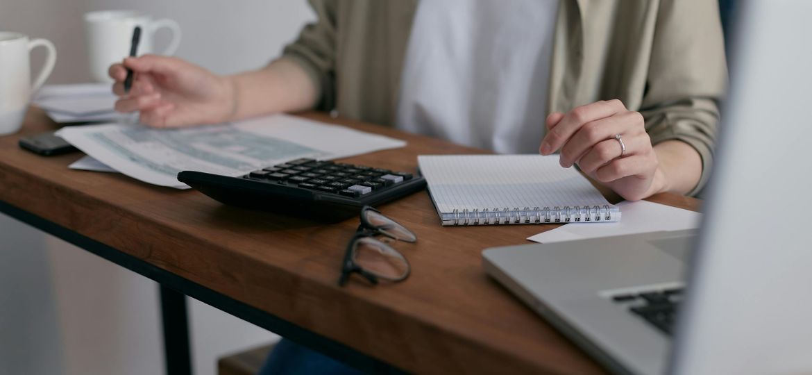 business owner working out how to pay their tax repayments